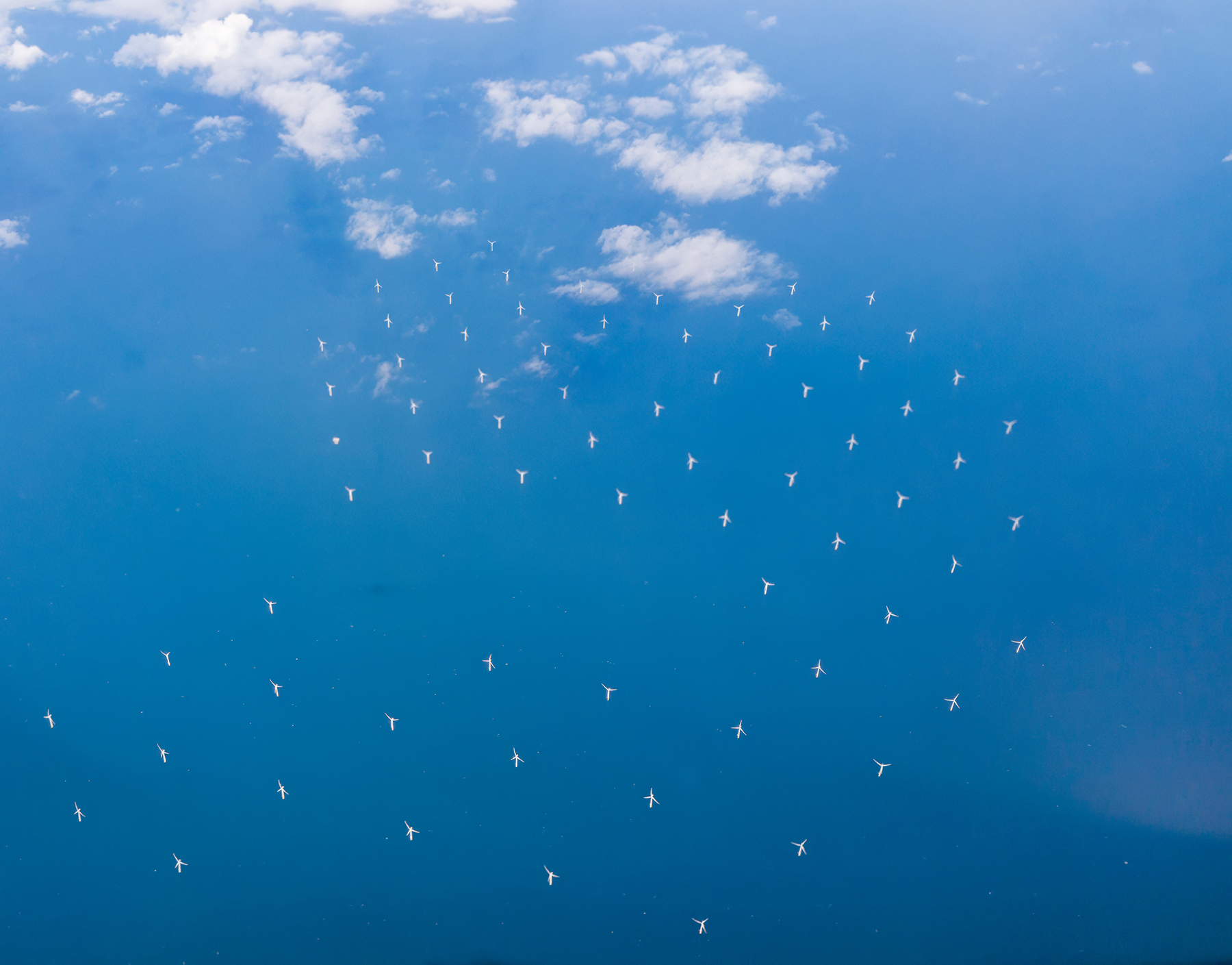 Looking down on an off-shore wind farm in the English Channel of